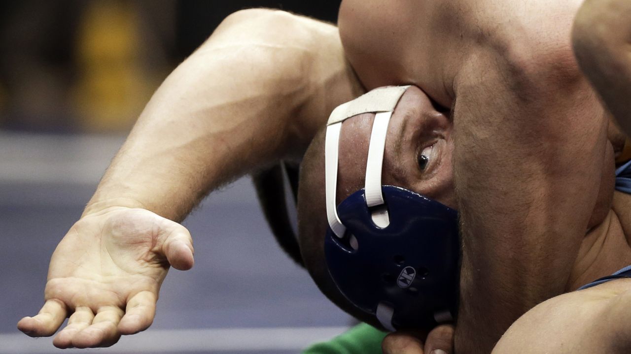 Citadel's Odie Delaney tries to avoid getting pinned by North Dakota State's Evan Knutson during their 285-pound match at the NCAA Division I wrestling championships on March 21 in Des Moines, Iowa. Delaney avoided the pin and won the match.