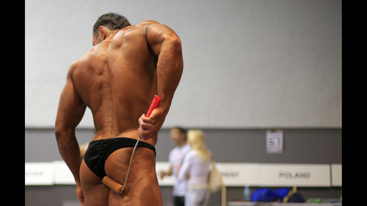 A competitor prepares backstage at the World Classic Bodybuilding Championship and Bikini-Fitness World Cup in St Polten, Austria, on November 16.