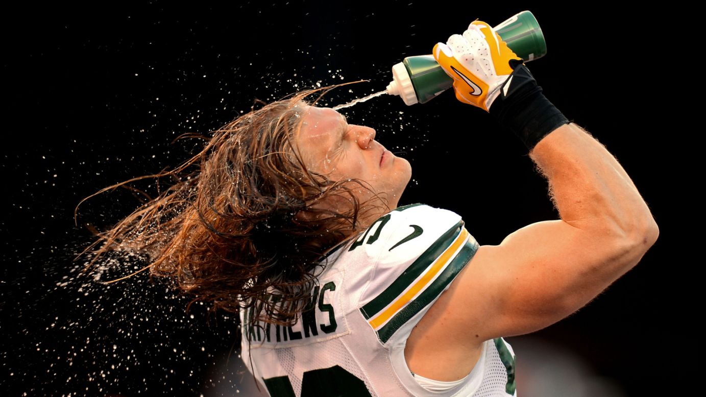 Green Bay Packers linebacker Clay Matthews sprays his face with water during warm-ups before the NFC Divisional Playoff Game against the San Francisco 49ers on January 12 at Candlestick Park in San Francisco. The 49ers won 45-31.