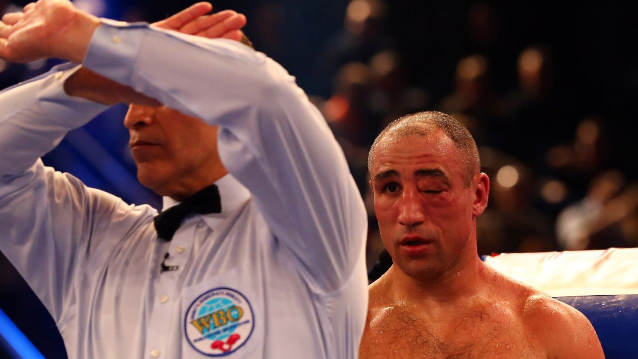 The referee stops Robert Stieglitz and Arthur Abraham of Germany during the WBO World Championship Super Middleweight title fight on March 23 at Getec Arena in Magdeburg, Germany.