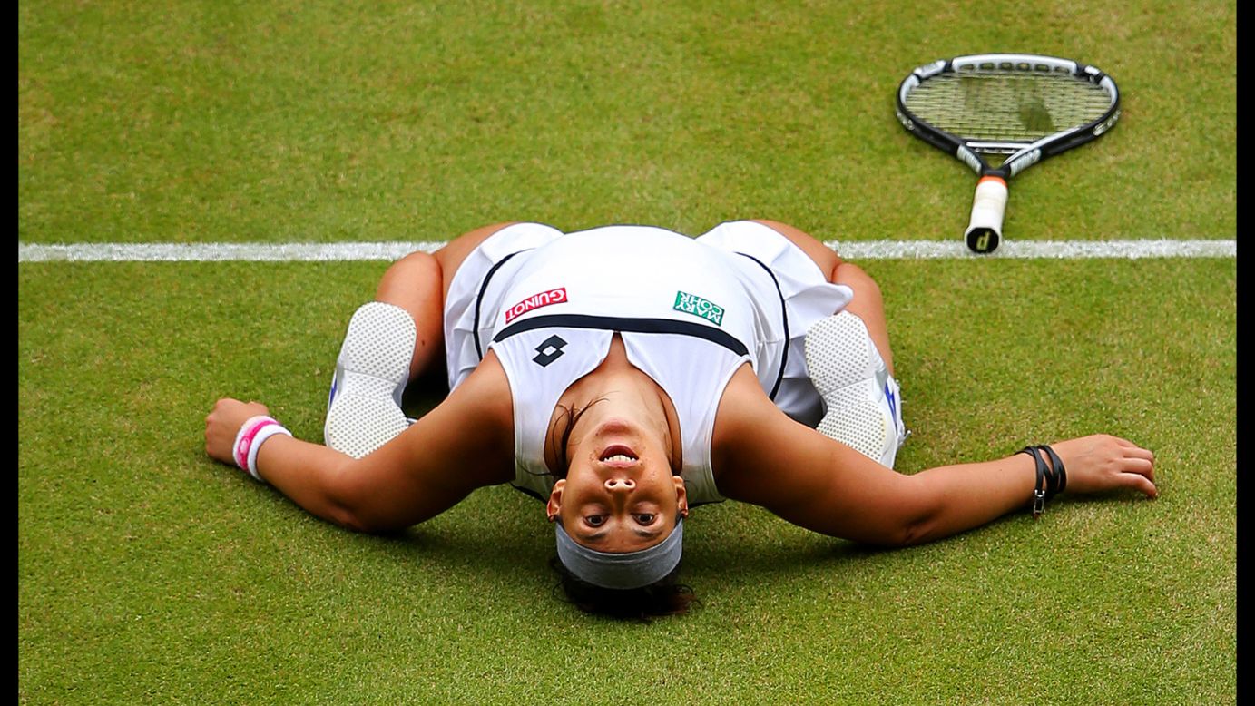 Marion Bartoli of France celebrates winning the ladies singles semifinal match against Kirsten Flipkens of Belgium on Day 10 of the Wimbledon Lawn Tennis Championships on July 4 in London.