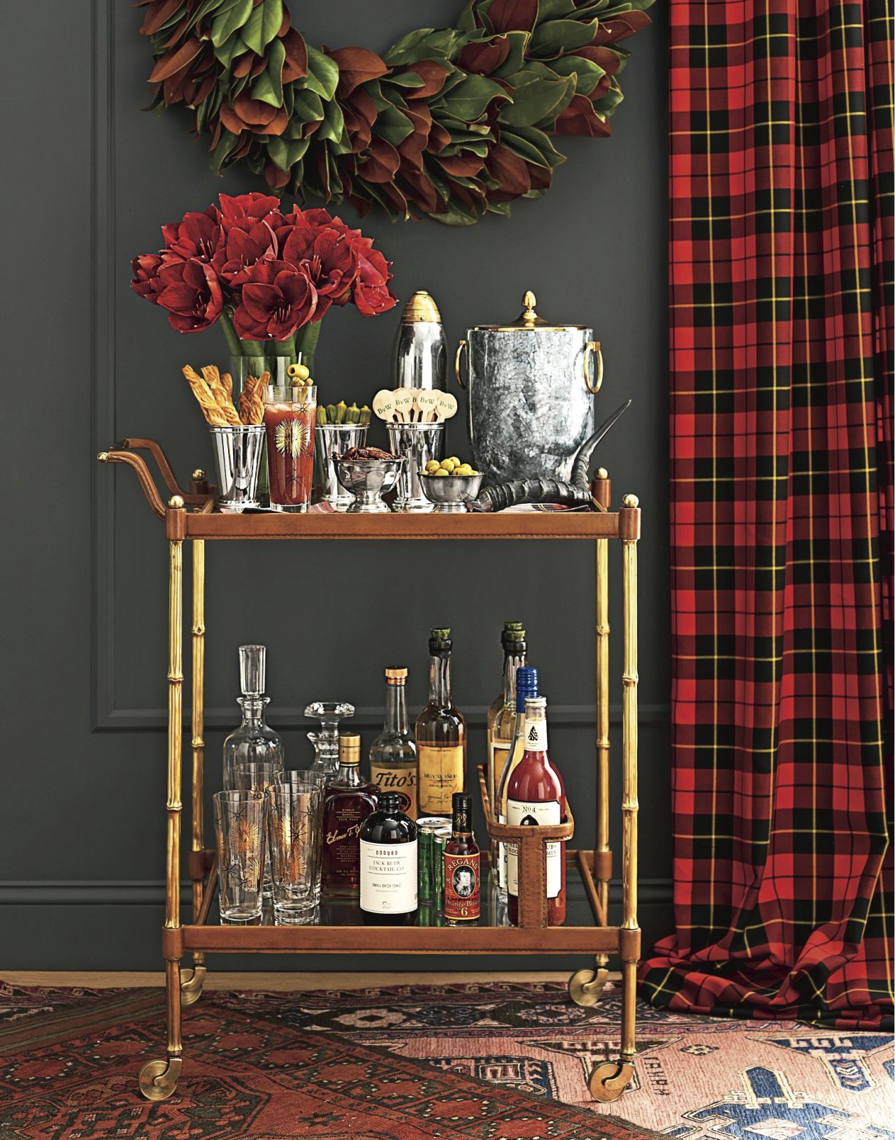 This bar cart gets a holiday treatment with silver bowls and an arrangement of amaryllis, but could easily transition to everyday decor.