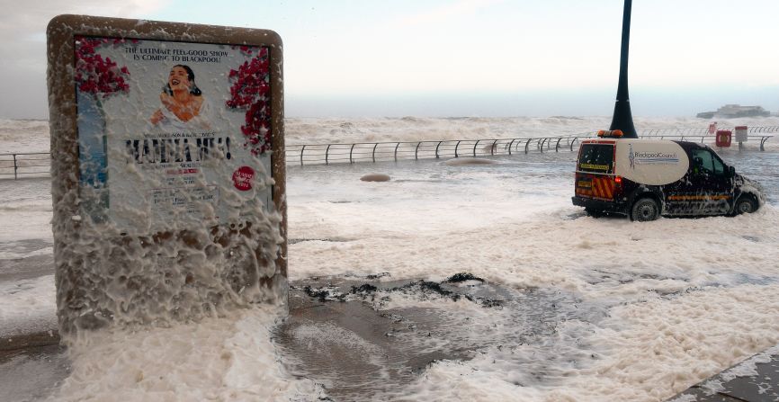 The tide turns to froth December 5 on the Blackpool promenade.