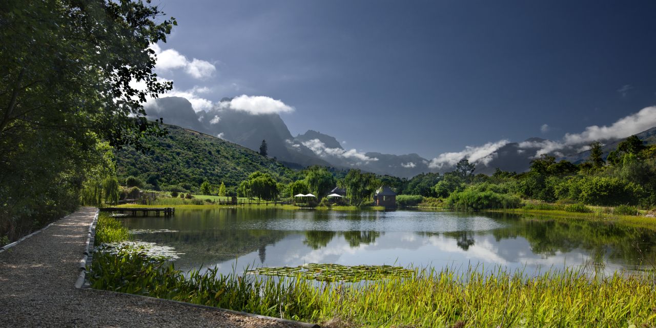 Stark-Condé boutique vineyard is 300 meters above sea level in the Jonkershoek valley. The pagoda-style tasting hut is set on an island in the middle of a lake.