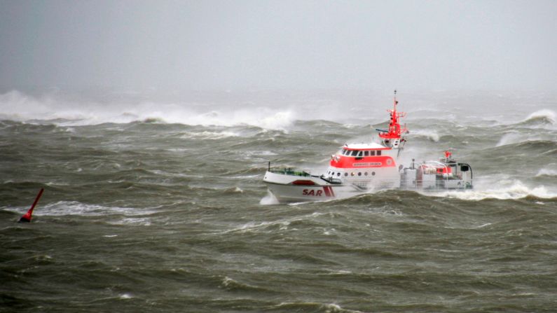 A rescue vessel patrols the rough waters around the North Sea island of Norderney, Germany, on December 5.