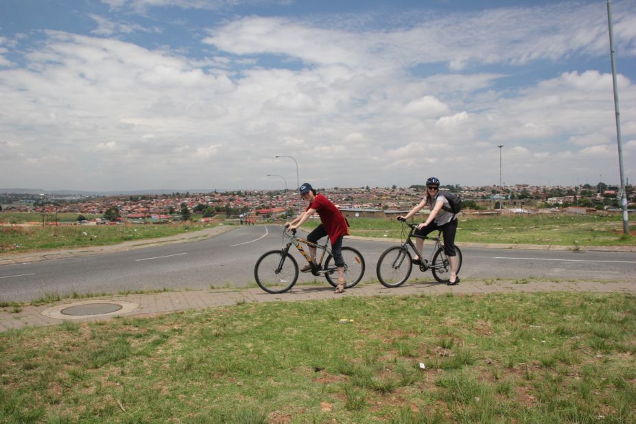 A bicycle tour is a better way to appreciate Soweto street life than from behind the windows of a tour bus.