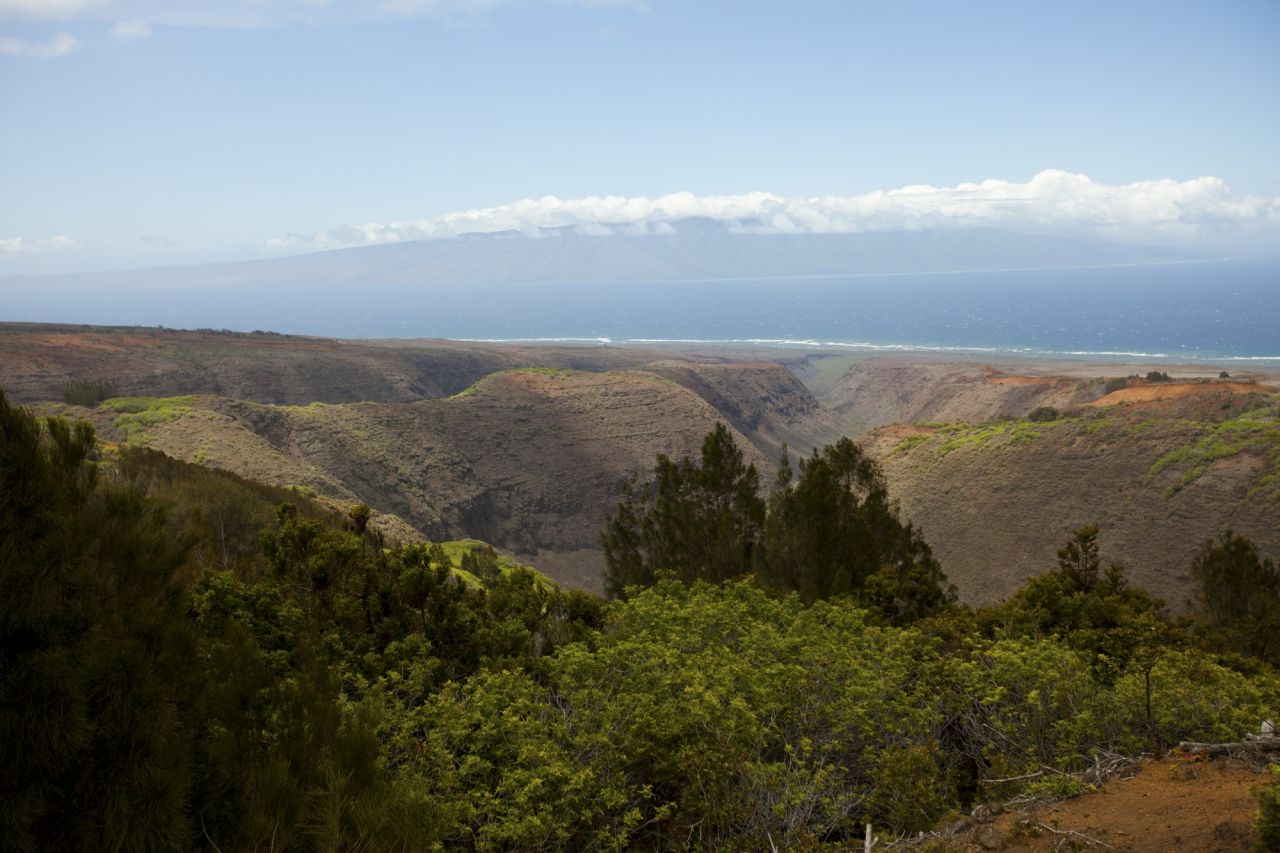 On the island of Lanai, you can see the valley view toward the nearby island of Molokai. 