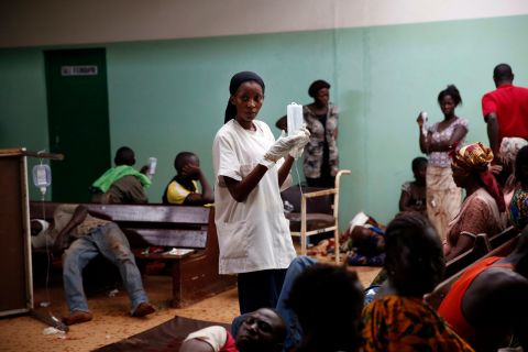 A nurse tends to the wounded at Bangui's hospital on December 5.