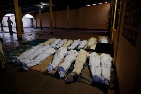Shrouded bodies are seen in a Bangui mosque December 5.