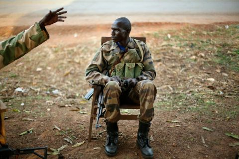 A Seleka soldier is briefed while manning a checkpoint in Boali, Central African Republic, on Wednesday, December 4.
