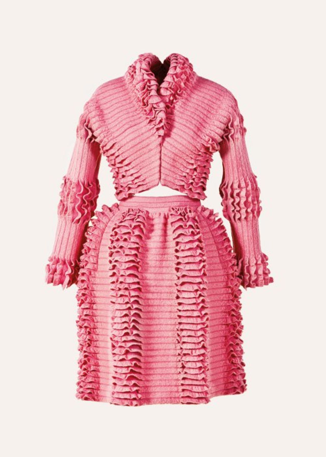 For Azzedine Alaïa fashion is a sculptural extension of the body. His work has been the subject of major solo exhibitions, such as <em>Azzedine Ala</em>ïa<em>in the 21st Century</em> at the Groninger Museum in 2011, and a retrospective at the Palais Galliera in Paris which opened this September. This soft pink skirt and jacket combo comes from a 2005 haute-couture collection.