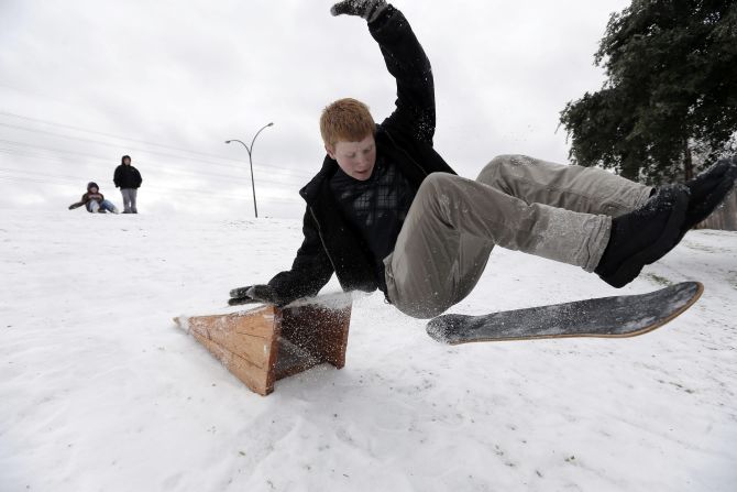 Matthew Eller catches air after sliding down a hill and jumping a ramp in Arlington, Texas, on December 6.