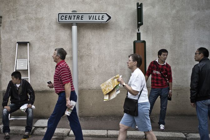 It's even less advisable to gawk at a map on the street when traveling alone. Sneak into a doorway.