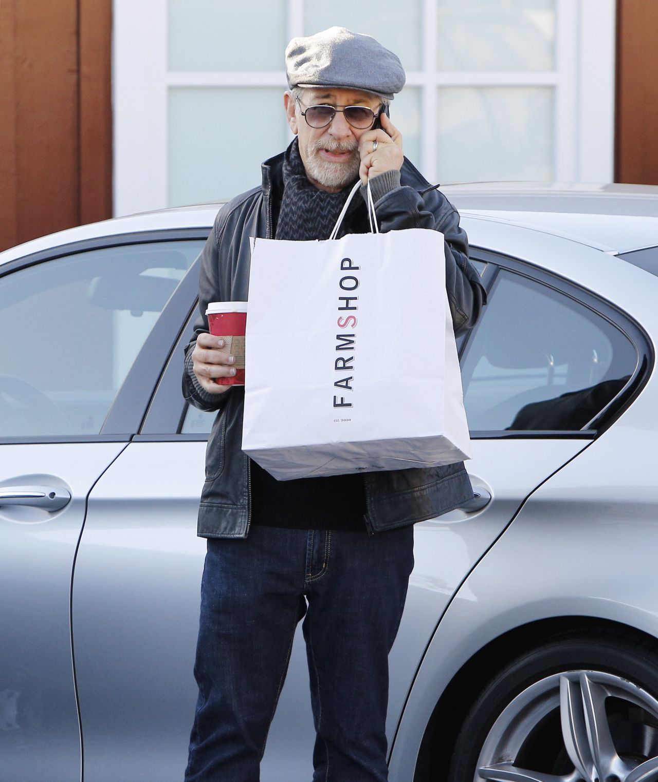 Steven Spielberg balances his coffee with his call on December 6. 