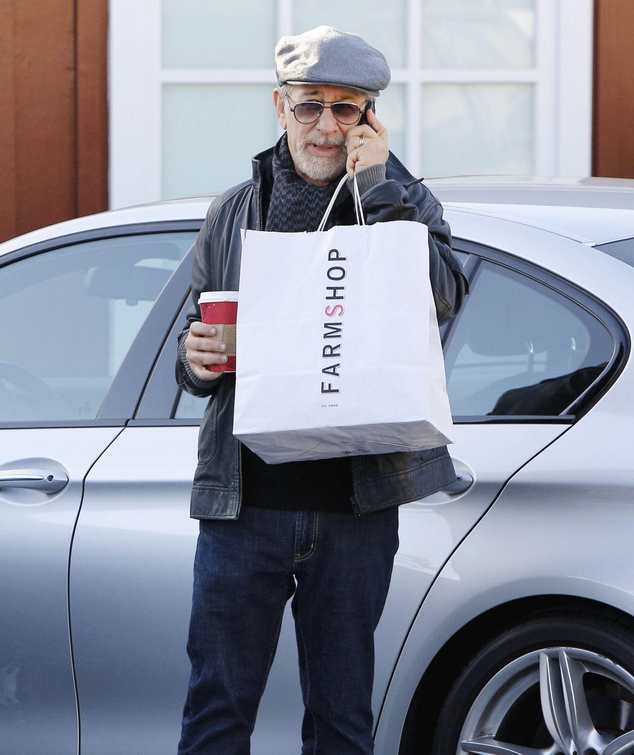 Steven Spielberg balances his coffee with his call on December 6.