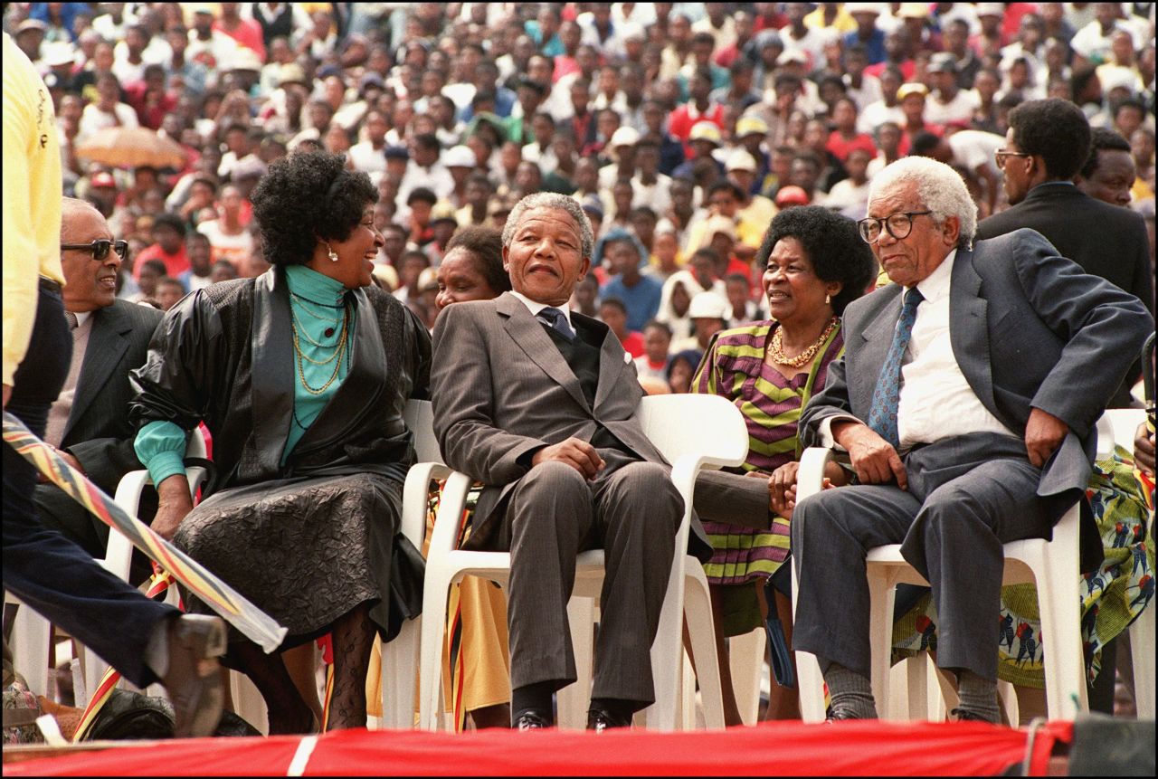 Walter Sisulu (right) is among the most respected leaders of the freedom movement in South Africa. The former ANC secretary-general was, like Mandela, jailed at Robben Island, where he served more than 25 years. In this photo, Sisulu is seated with Nelson Mandela (c), his then-wife Winnie (l), and Sisulu's wife Albertina (2nd-r), at a rally to celebrate Mandela's release from jail in 1990.