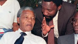 ANC Secretary General Cyril Ramaphosa (L) chats with Nelson Mandela on November 18, 1993.