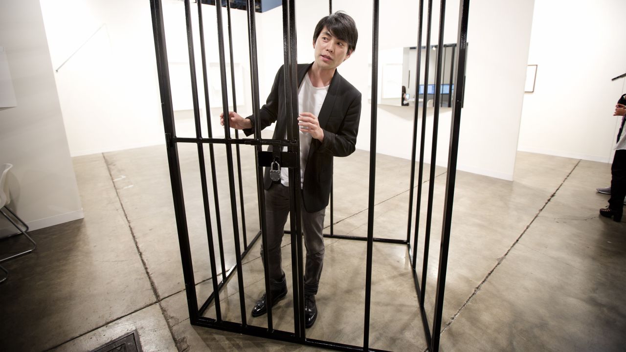 Shohei Shigematsu, from New York, stands inside one of Eduardo Baswaldo's installations on December 4. 