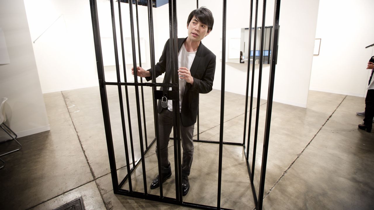 Shohei Shigematsu, from New York, stands inside one of Eduardo Baswaldo's installations on December 4.