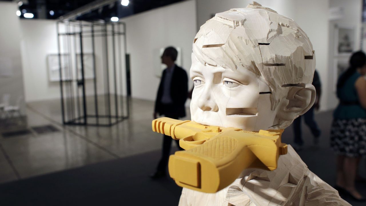 A piece by Gehard Demetz titled "Stones in My Pocket" is on display at Art Basel Miami Beach 2013 on December 4.