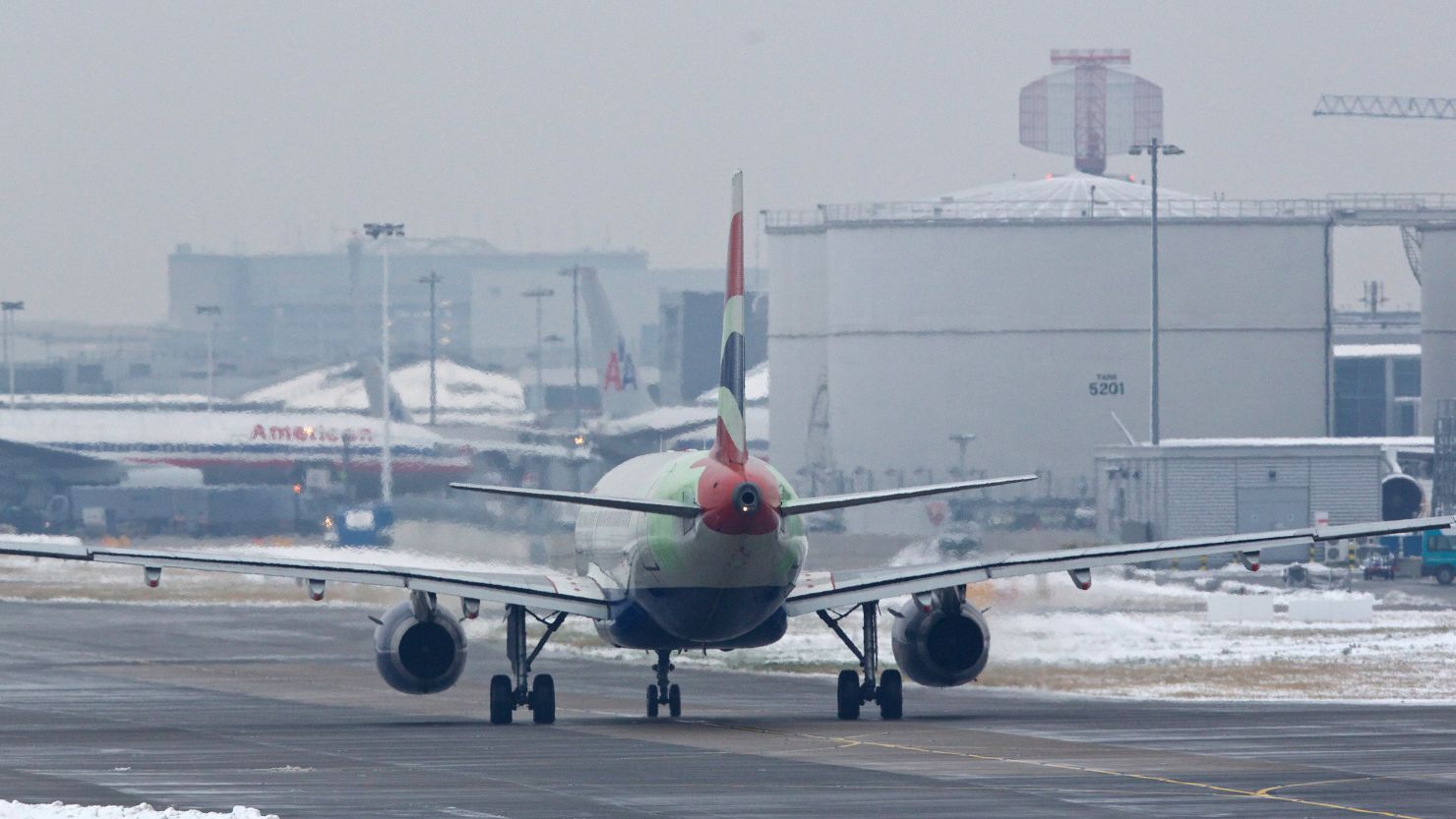 A British Airways plane taxis on the runway at Heathrow airport in west London on January 21, 2013.