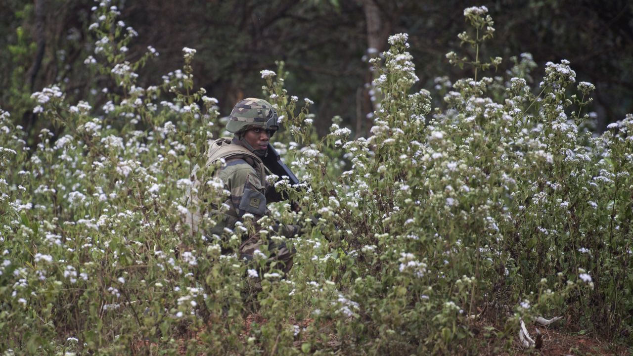 A French soldier watches the road in Baoro on December 7. 