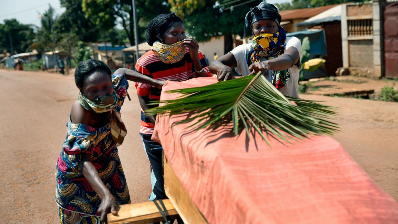 Women push a coffin in the streets of Bangui on December 7. Violence has raged in the Central African Republic since a coalition of rebels deposed President Francois Bozize in March, the latest in a series of coups since the nation gained independence. 