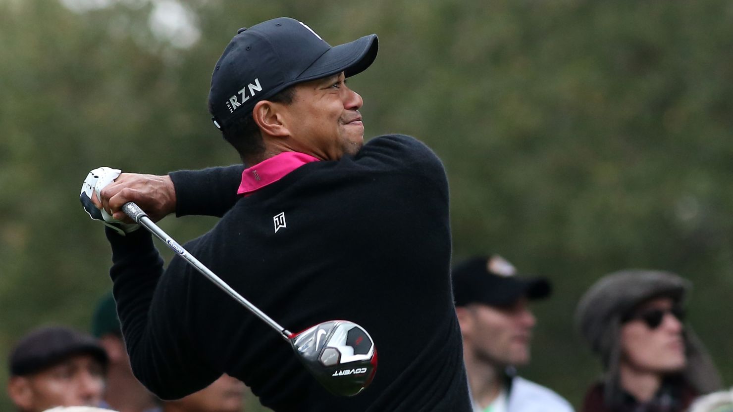 Tiger Woods hits another accurate tee shot on the way to a course record equaling 62 in California. 