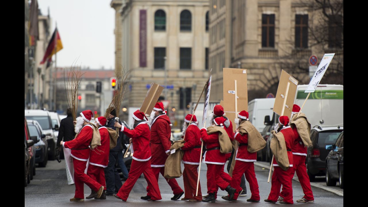 Inkota activists dressed as Santa Claus demonstrate in support of the "Make Chocolate Fair!" campaign on December 5 in Berlin. The campaign promotes fair-trade chocolate and better working conditions for cacao farmers in Africa.