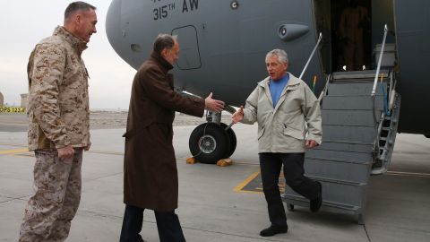 U.S. Secretary of Defense Chuck Hagel (R) arrives on a C17 Military aircraft, on December 7, 2013 in Kabul, Afghanistan.