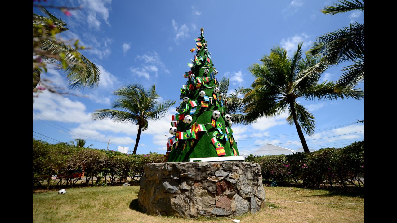 A Christmas tree decorated with footballs and national flags stands on the grounds of the Costa do Sauipe Resort in Costa do Sauipe, Brazil, on December 4. The resort was the venue for the final draw of the 2014 FIFA World Cup.