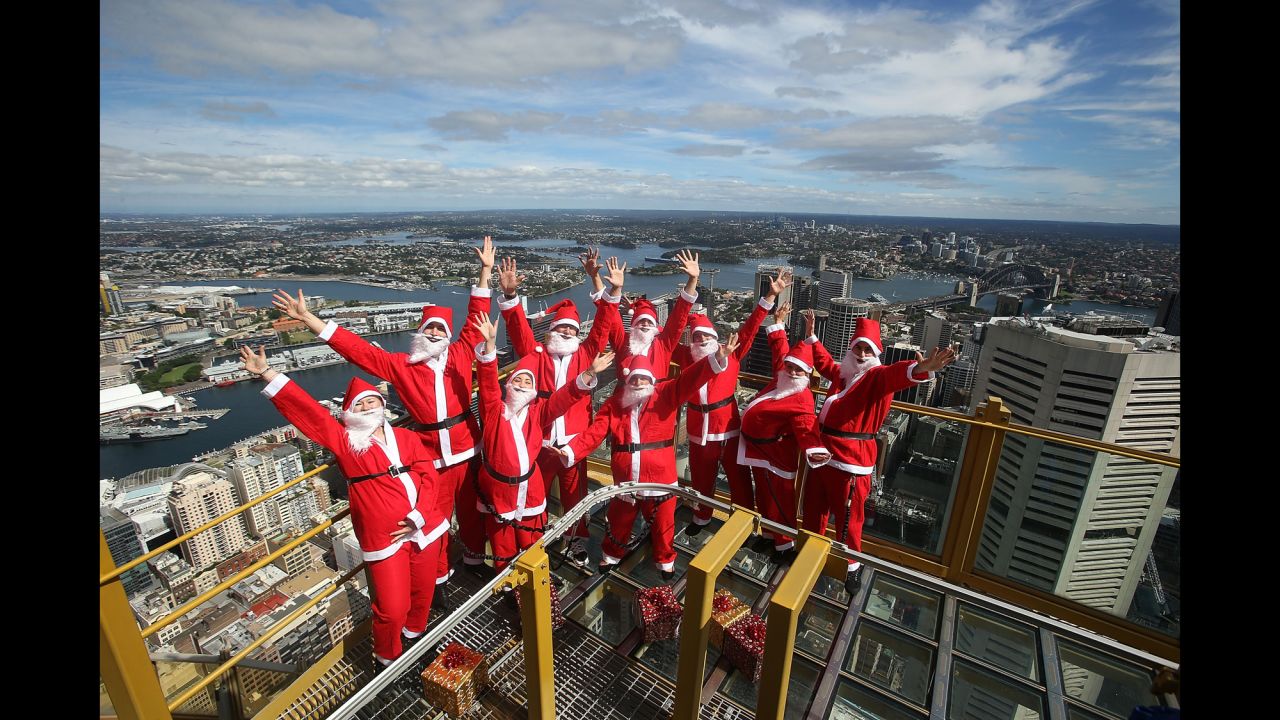 Santas visit the Skywalk at Sydney Tower on December 2 in Sydney.