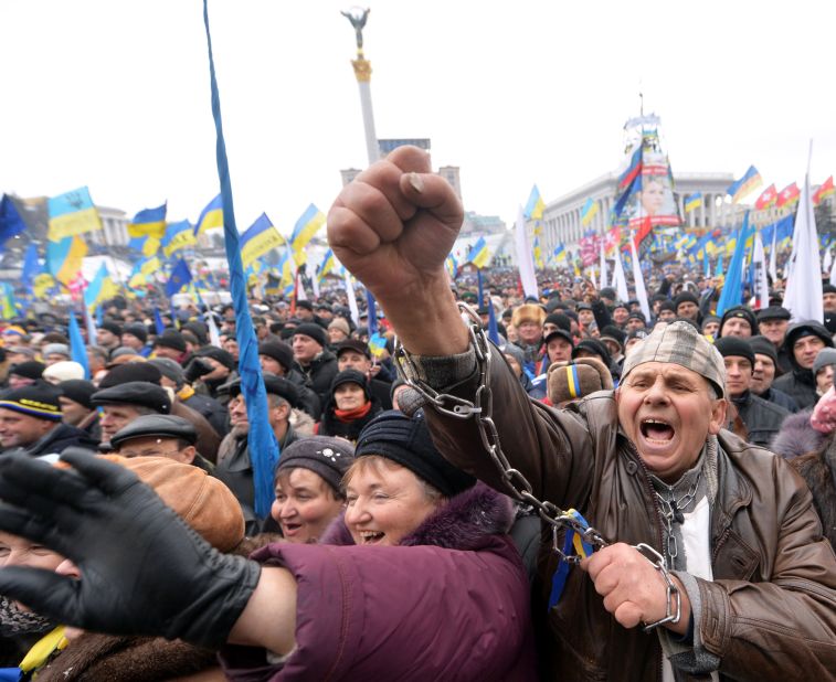 Demonstrators shout slogans during the mass rally on December 8.