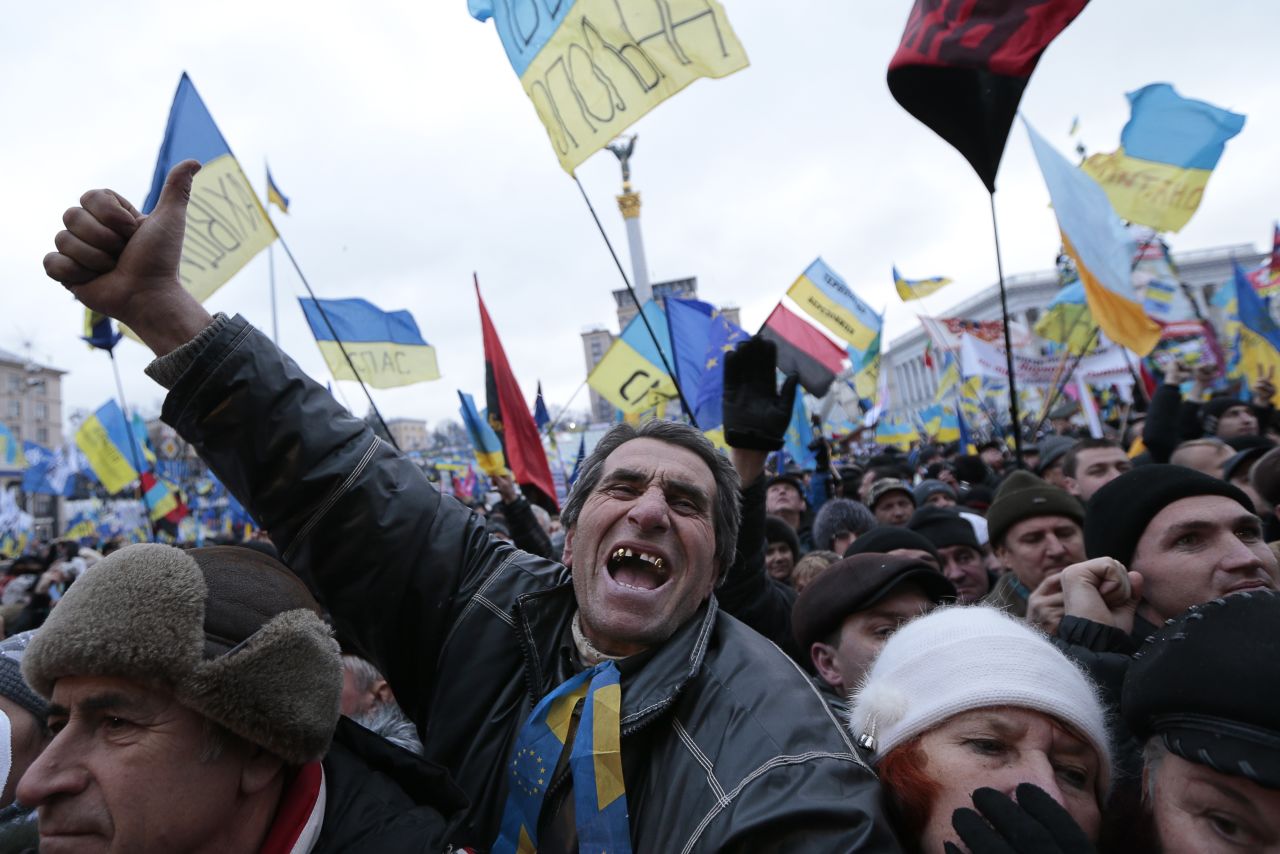 Pro-EU activists shout slogans during the rally in Independence Square on December 8.