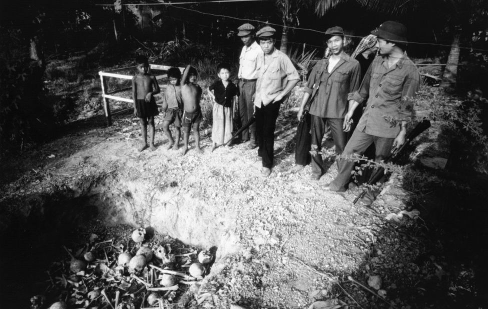 At least 1.7 million people were killed under the Khmer Rouge's brutal regime, which controlled Cambodia from 1975 to 1979. This photo shows open mass graves in 1979.