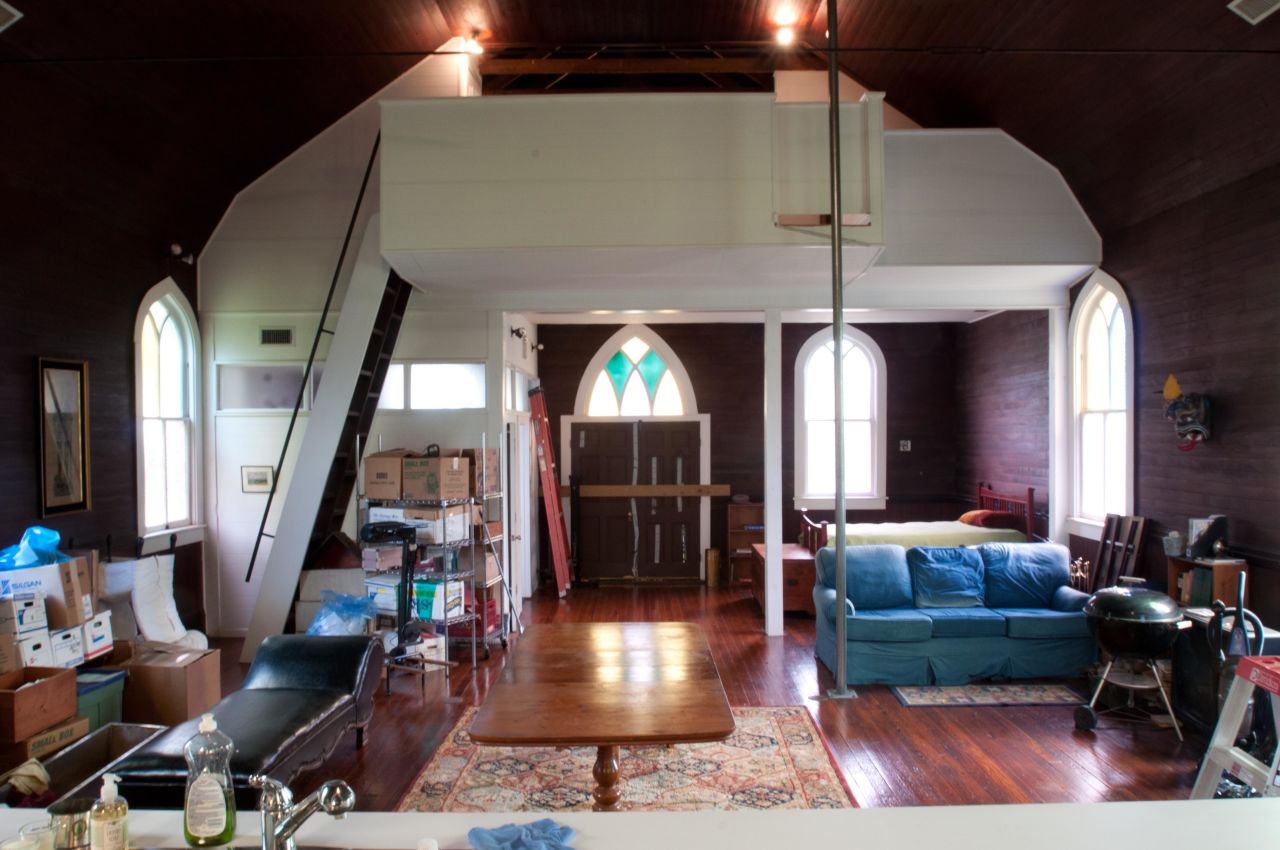 With the help of friends, Johnson built the loft that became the master bedroom. 