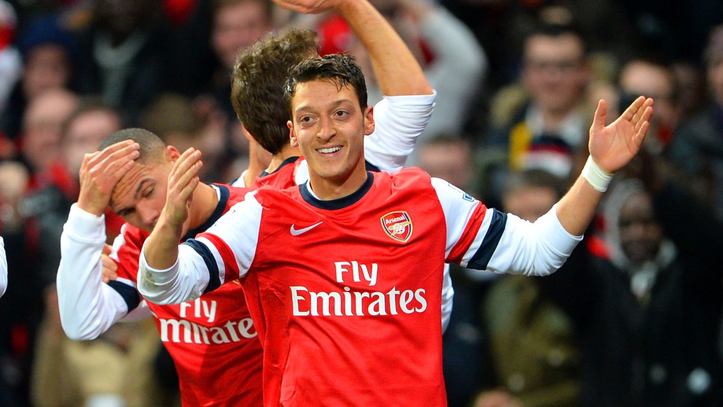 Mesut Ozil celebrates after scoring for Arsenal against Everton but the Merseysiders struck back moments later.  