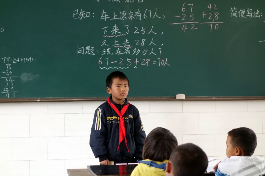 The class monitor answers a teacher's question.  Learning by rote still plays a big role in China's education system. 