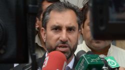 Samiullah Afridi (C), lawyer for Pakistani doctor Shakil Afridi, who assisted the CIA in their hunt for Osama bin Laden, speaks with the media after a hearing in Peshawar on October 30, 2013.