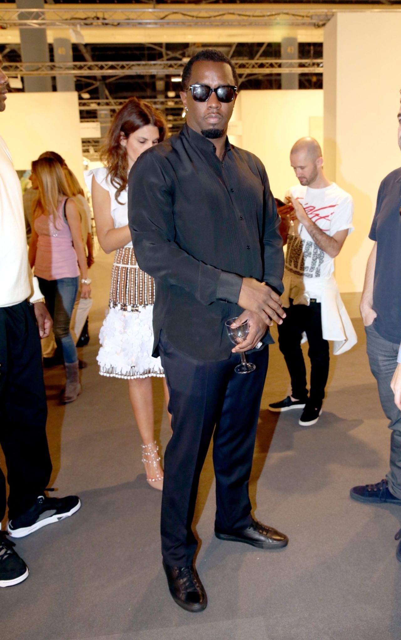 A regular in Miami, Sean P "Diddy" Combs was spotted admiring works by Jeff Koons. In 2012 he reportedly purchased a $65,000 sculpture by Ivan Navarro.