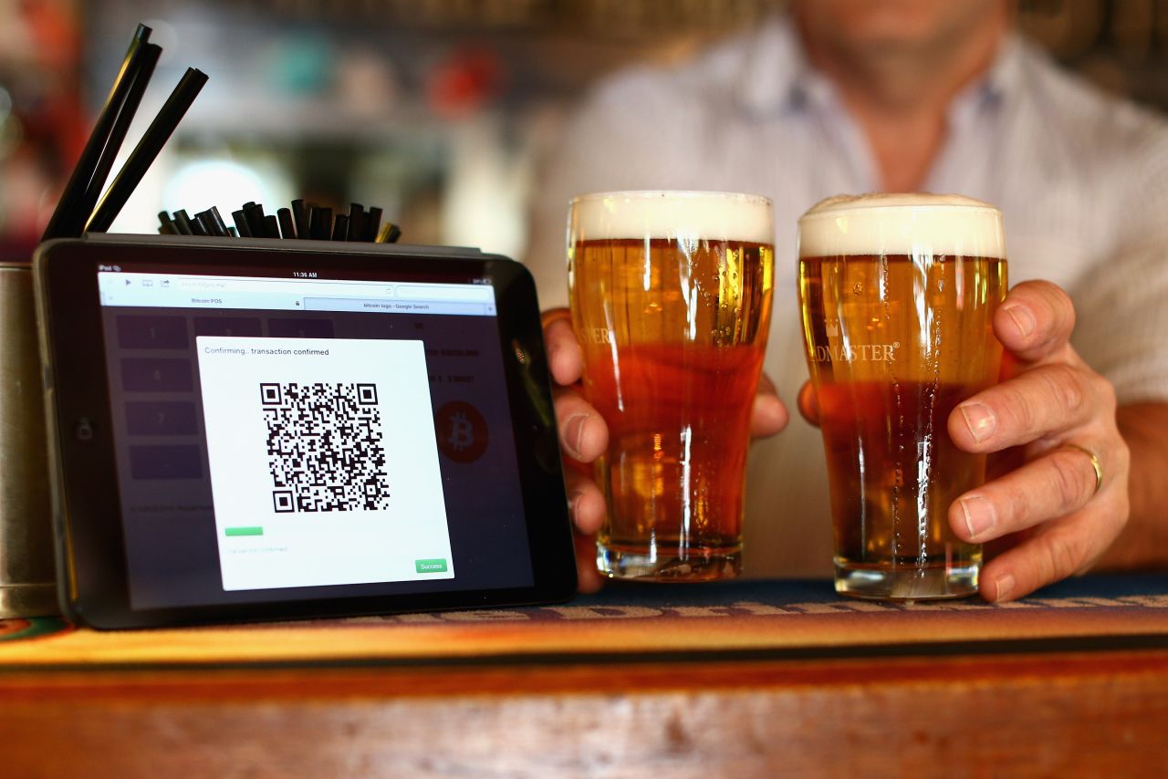 But that has not yet stopped the popularity of Bitcoin growing. A terminal to accept payments using Bitcoins (pictured) is displayed on the bar at the Old Fitzroy pub in Sydney, Australia on September 19, 2013. 