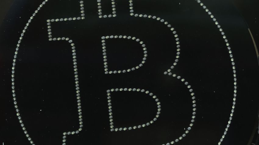  A symbol in the window of a local pub indicates the acceptance of Bitcoins for payment on April 11, 2013 in Berlin, Germany. Bitcoins are a digital currency traded on the MTGox exchange