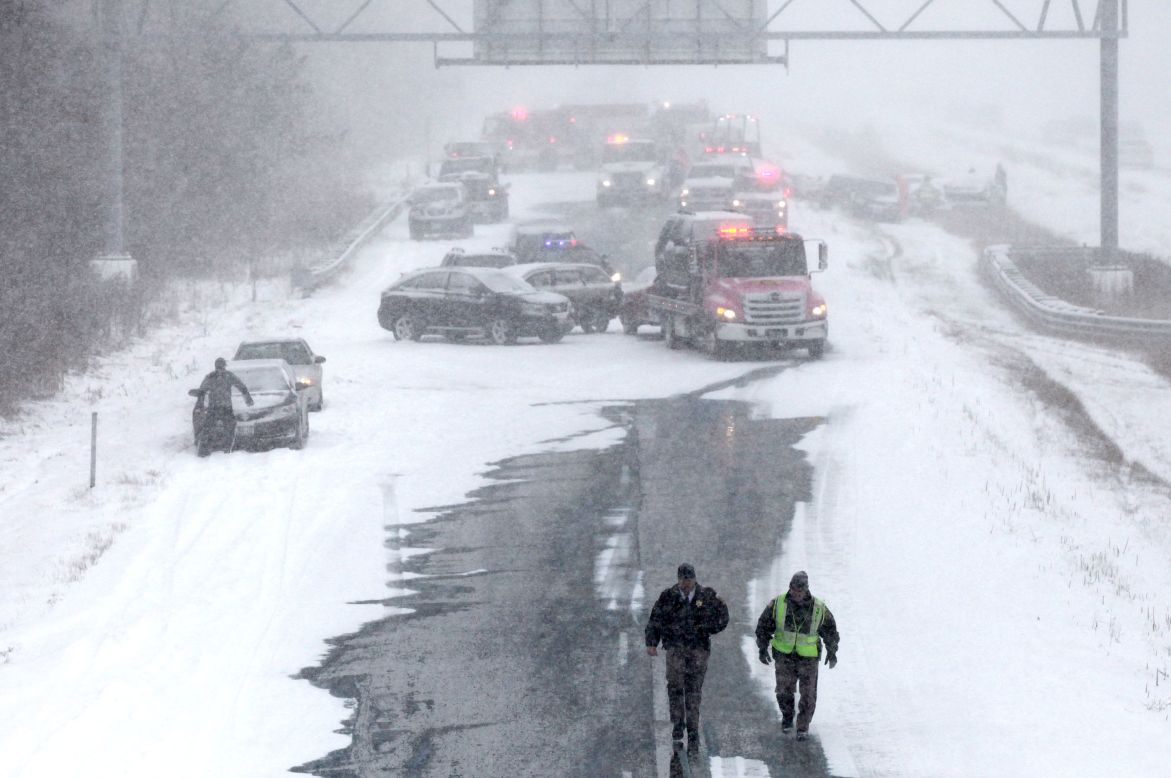 Emergency personnel respond to an accident on southbound Interstate 43 in Mequon, Wisconsin, on Sunday, December 8.