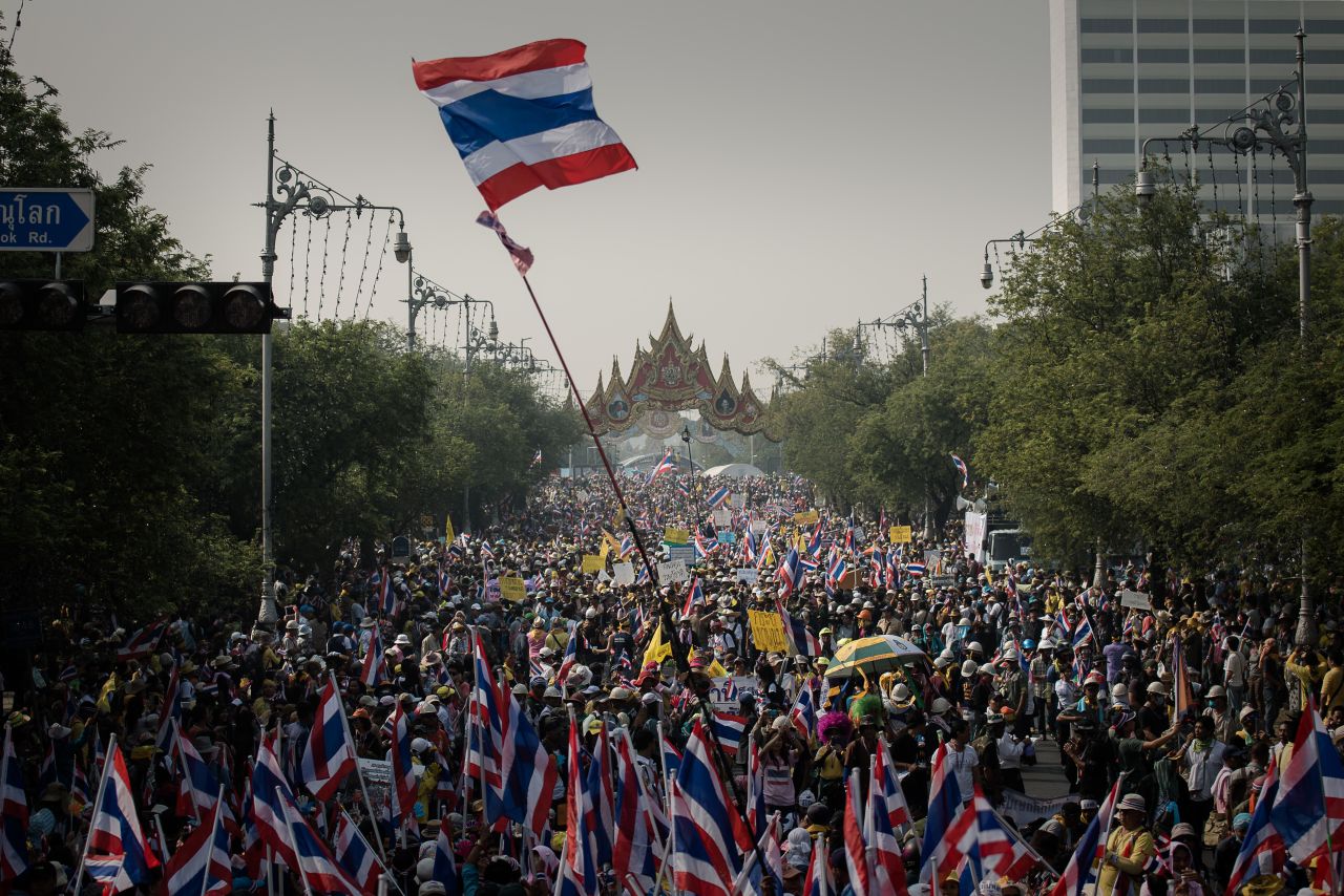 Demonstrators march towards government buildings in Bangkok on December 9 even after Thailand's PM, Yingluck Shinawatra, called a snap election in attempts to defuse the kingdom's political crisis.