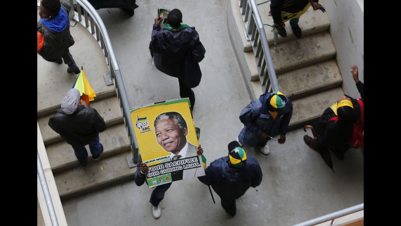 People walk around the FNB Stadium in Johannesburg.