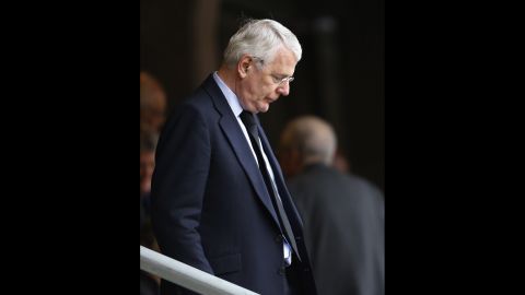 Former British Prime Minister John Major arrives for the memorial service.