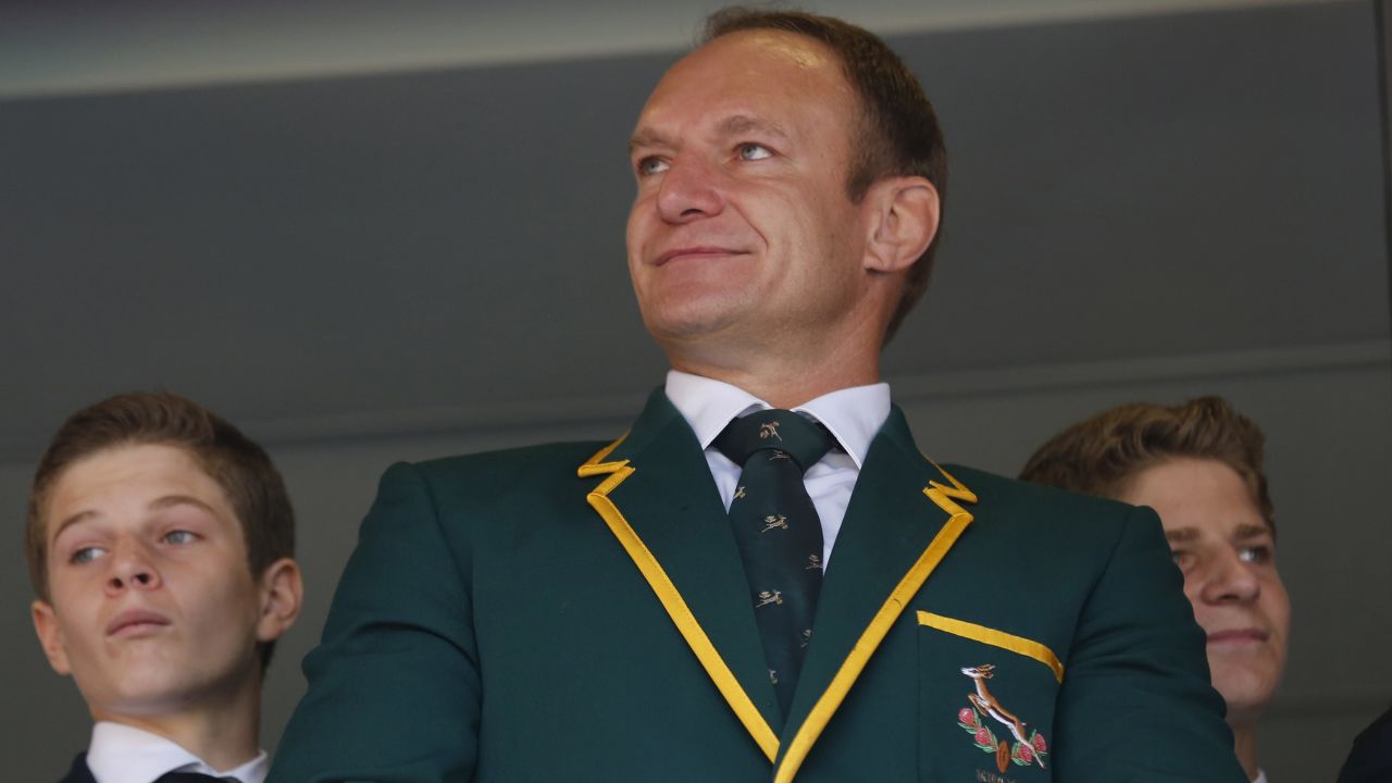 South Africa Rugby Union captain Francois Pienaar waits for the memorial service to begin.