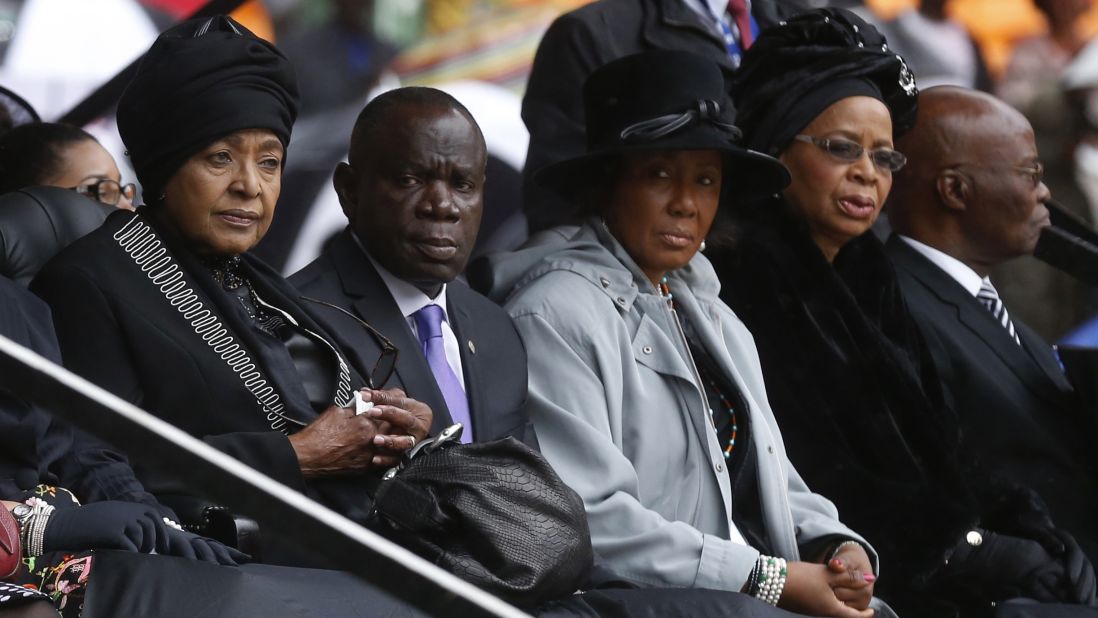 Mandela's ex-wife, Winnie Madikizela-Mandela, left, and his widow, Graca Machel, right, sit near each other during the memorial service.