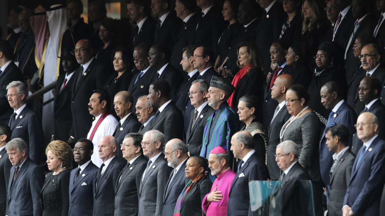 Dignitaries from all over the world stand at the beginning of the memorial service.