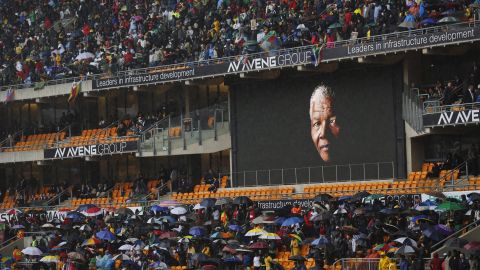 Mandela's face looms large on a billboard inside FNB Stadium.